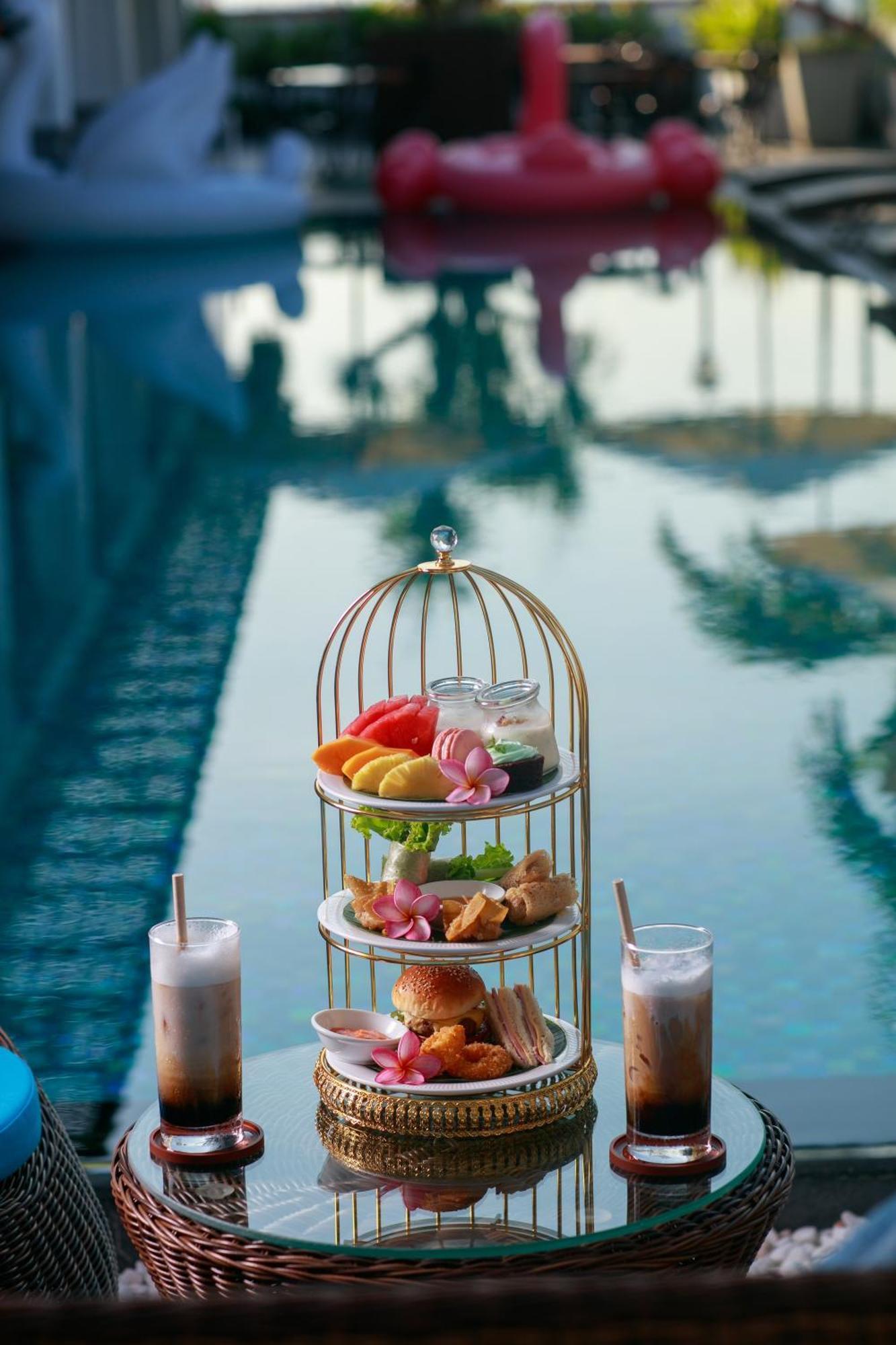 Grand Sunrise Palace Hoi An- A Luxury Indochine Hotel & Spa Dış mekan fotoğraf Afternoon tea at the Royal Mirage